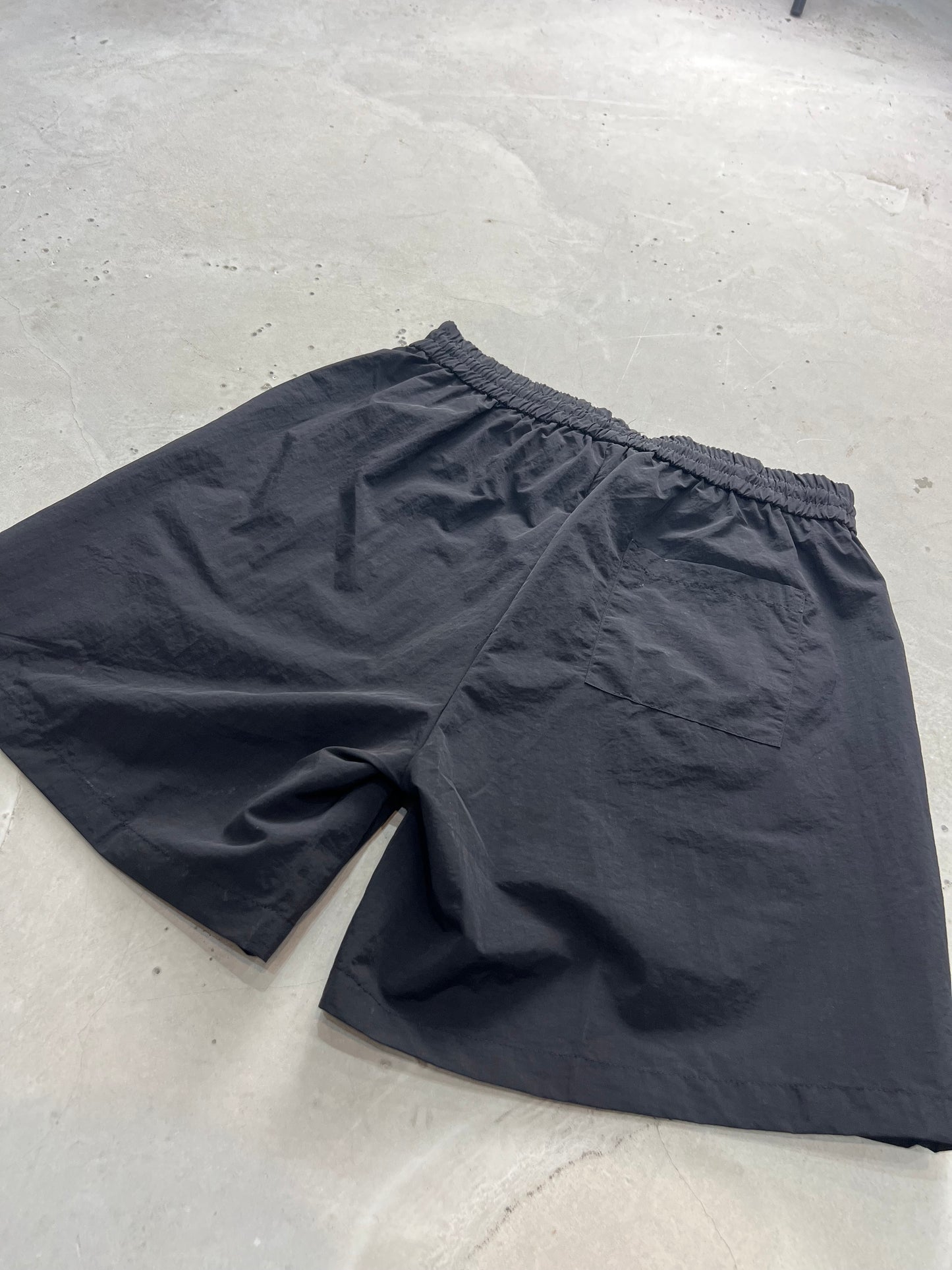 Black nylon shorts